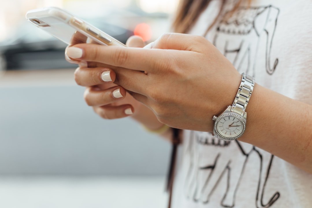 Hands holding a smartphone